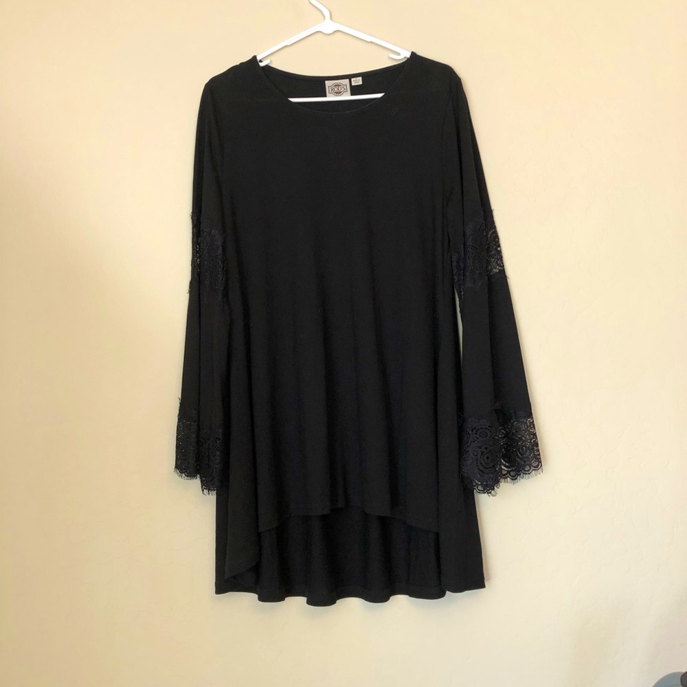 Black tunic with lace inset sleeves.